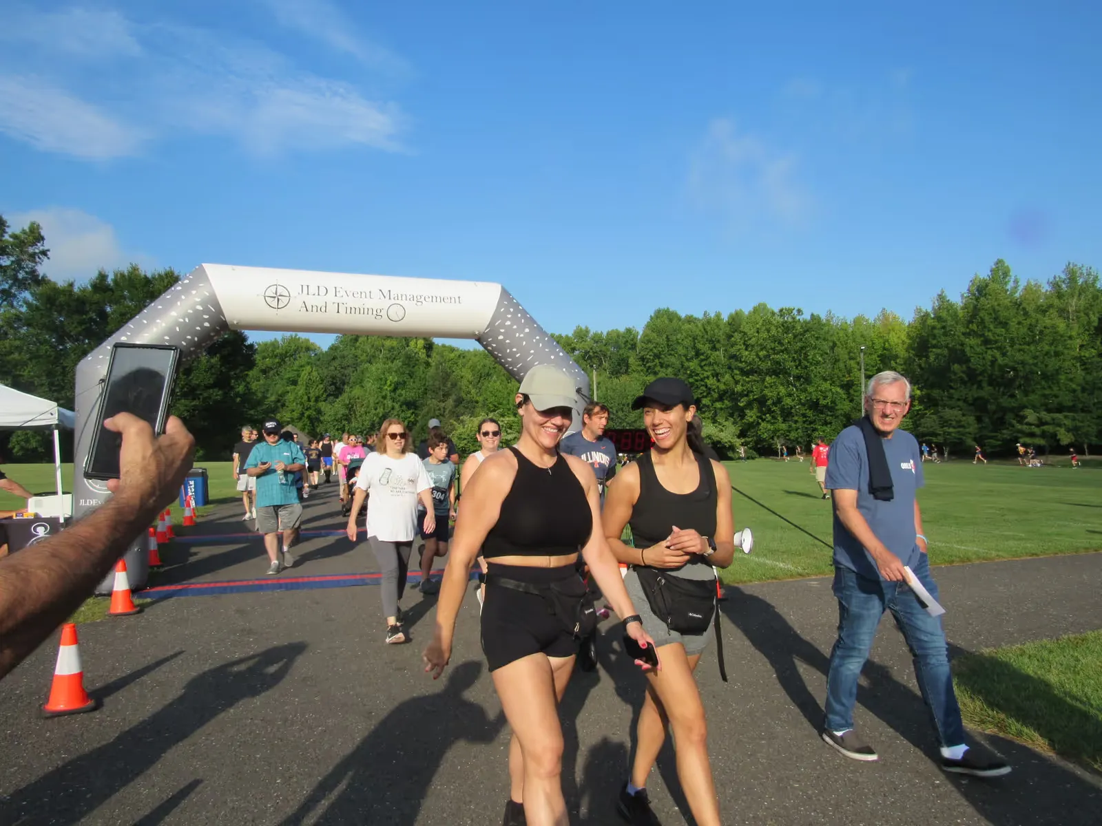 Walkers head out under the arch